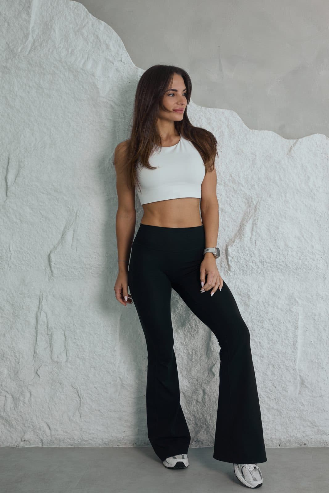 Elle, personal trainer in Dubai, standing in a studio